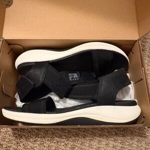 Clarks Black Sandals with White Sole